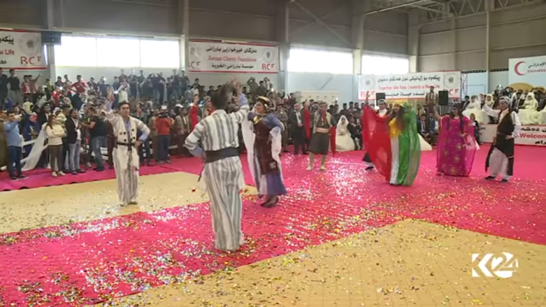 بالصور.. اربيل تحتضن عرسا جماعيا لـ 214 شابا وشابة